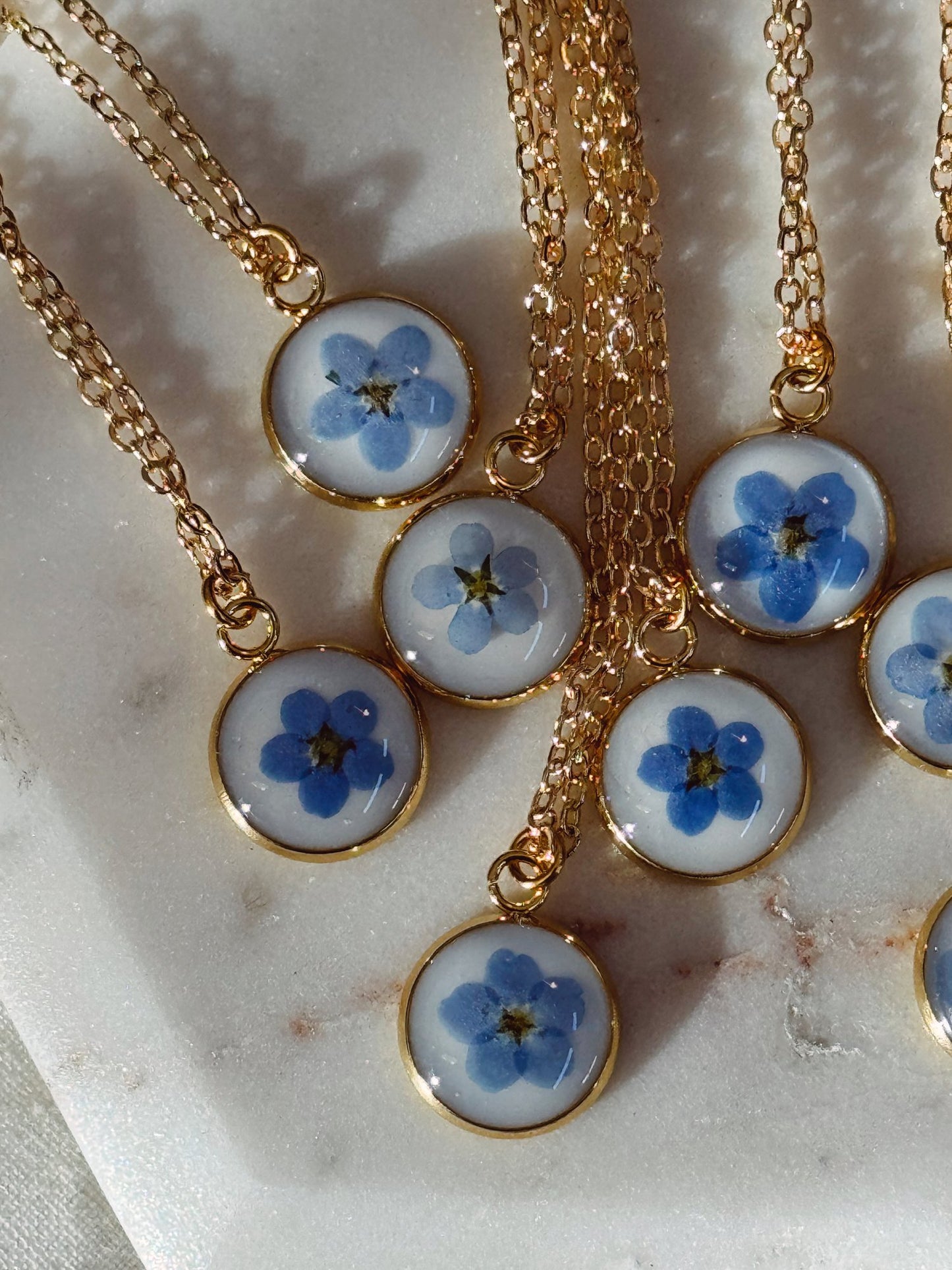Forget-me-not necklaces